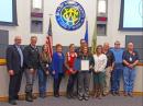 The Washoe County Proclamation Ceremony: ARRL Washoe County Emergency Coordinator Bob Miller WA6MTY, is at the far right-hand side.